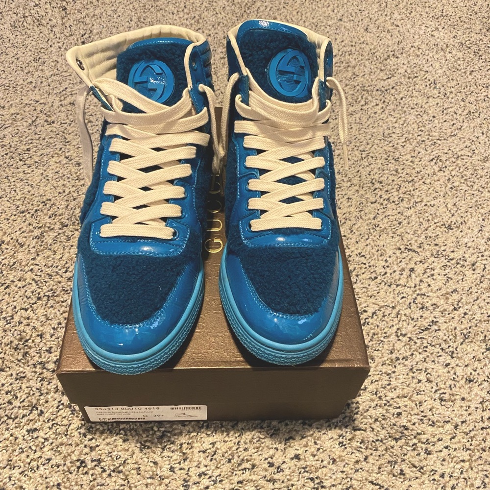 Gucci sneakers barely worn. Open to reasonable offers.